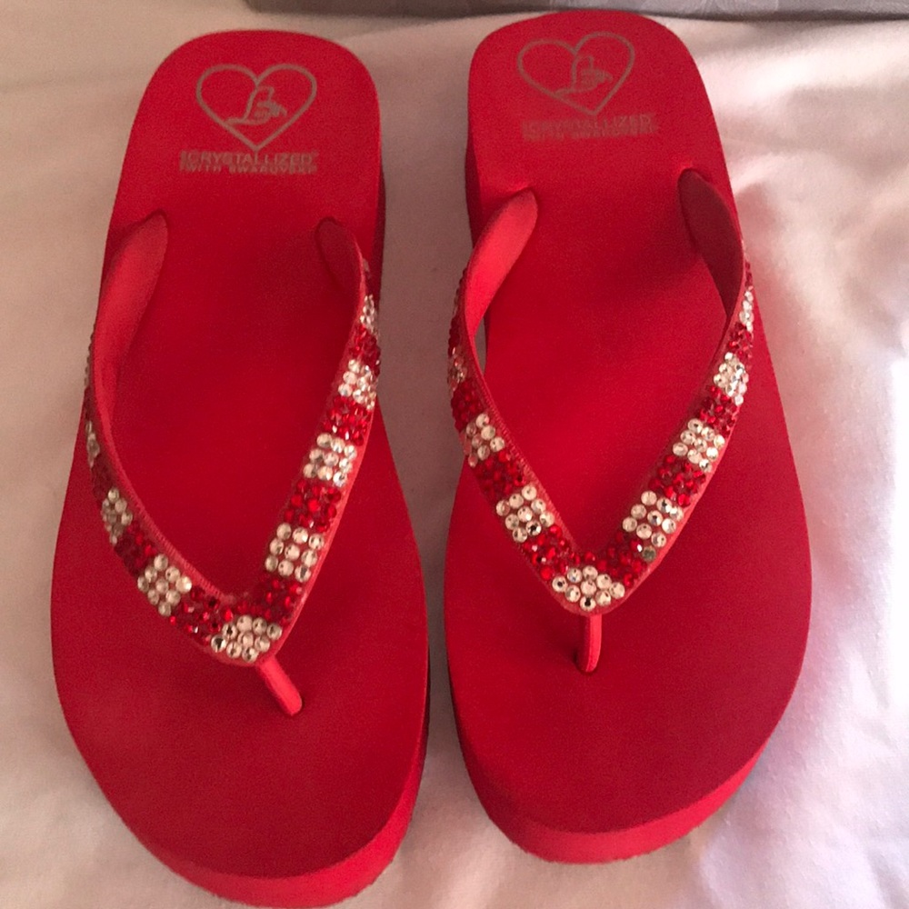 Lightly worn lady lanell flip flops